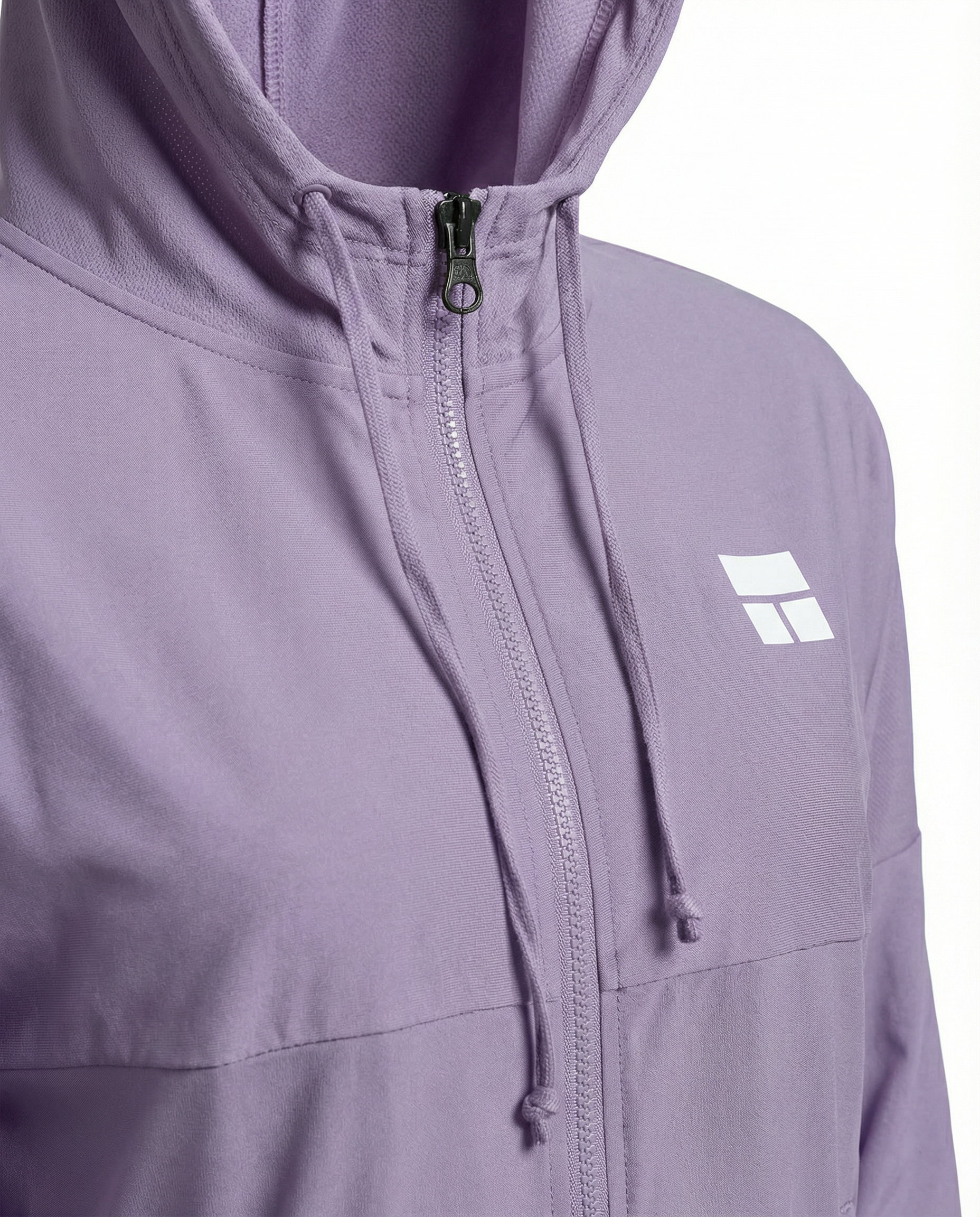 Woman wearing a purple hoodie with a brand logo on a white background