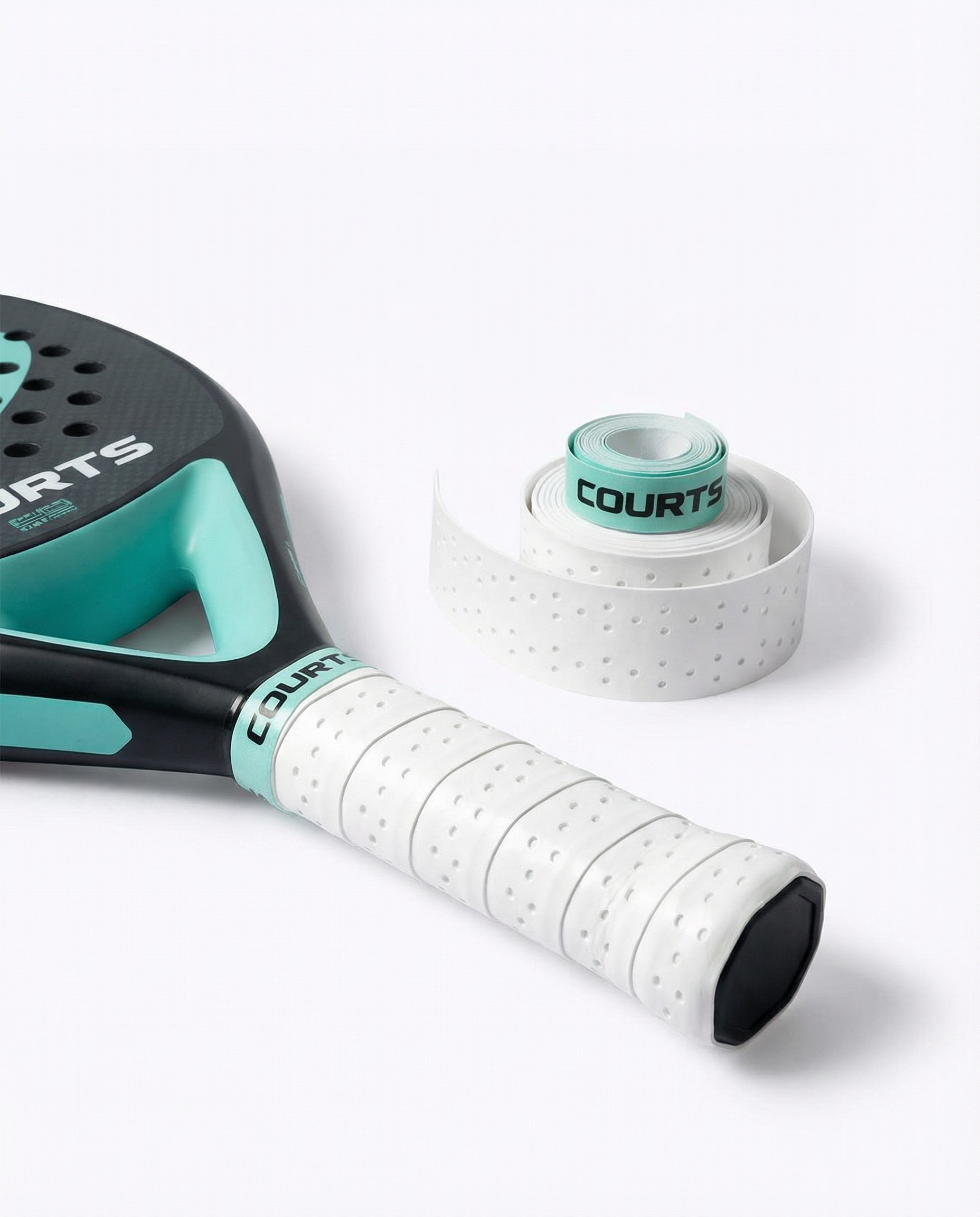 black padel and tennis racket handle with white grip and 'COURTS' branding on a white background
