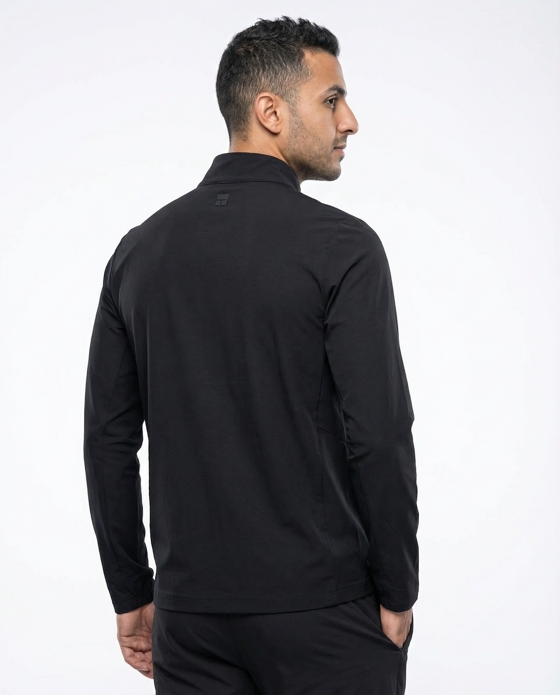 Man wearing a black jacket on a white background
Courts Sport