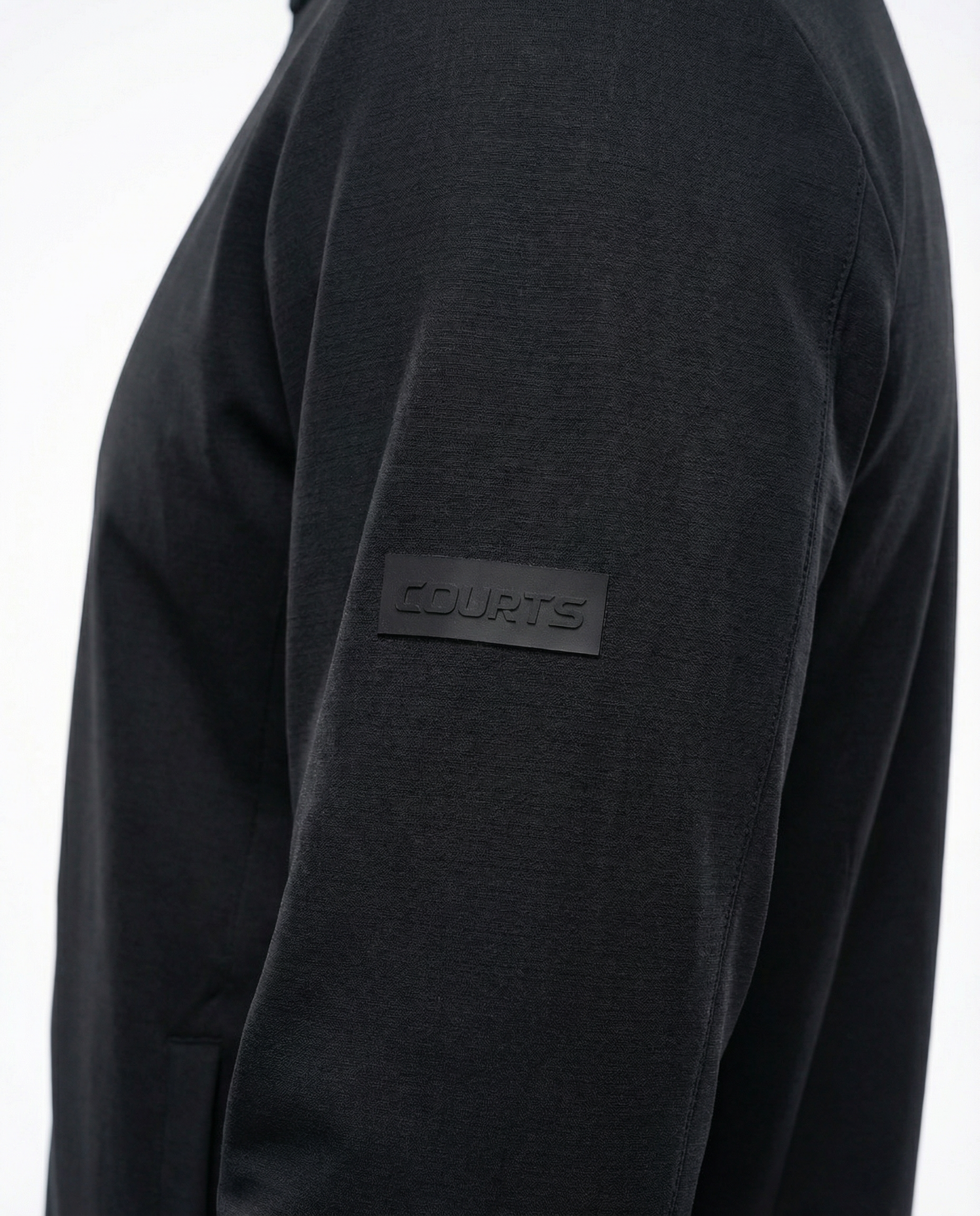 Man wearing a black jacket on a white background
Courts Sport