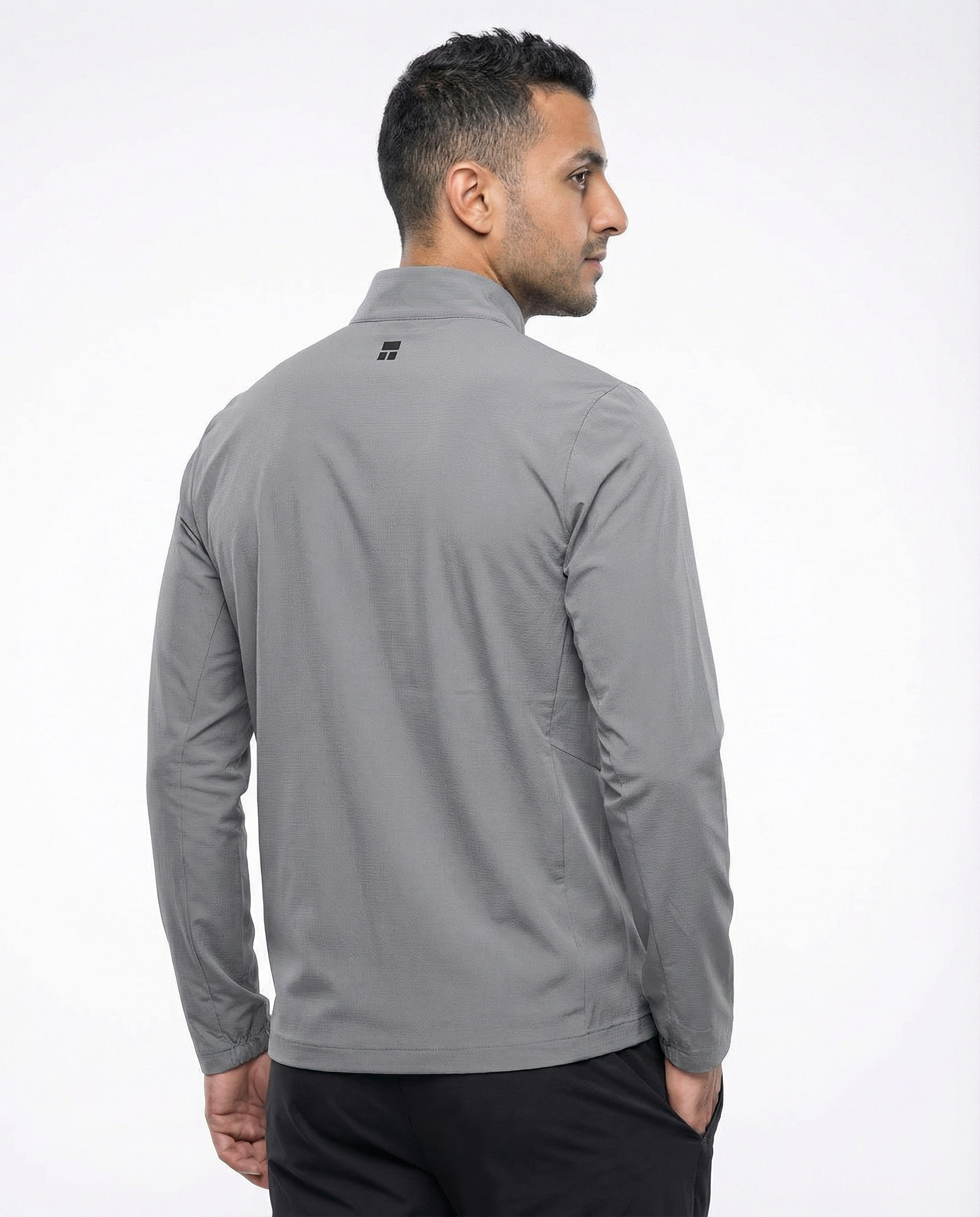 Man wearing a grey jacket on a white background
Courts Sport