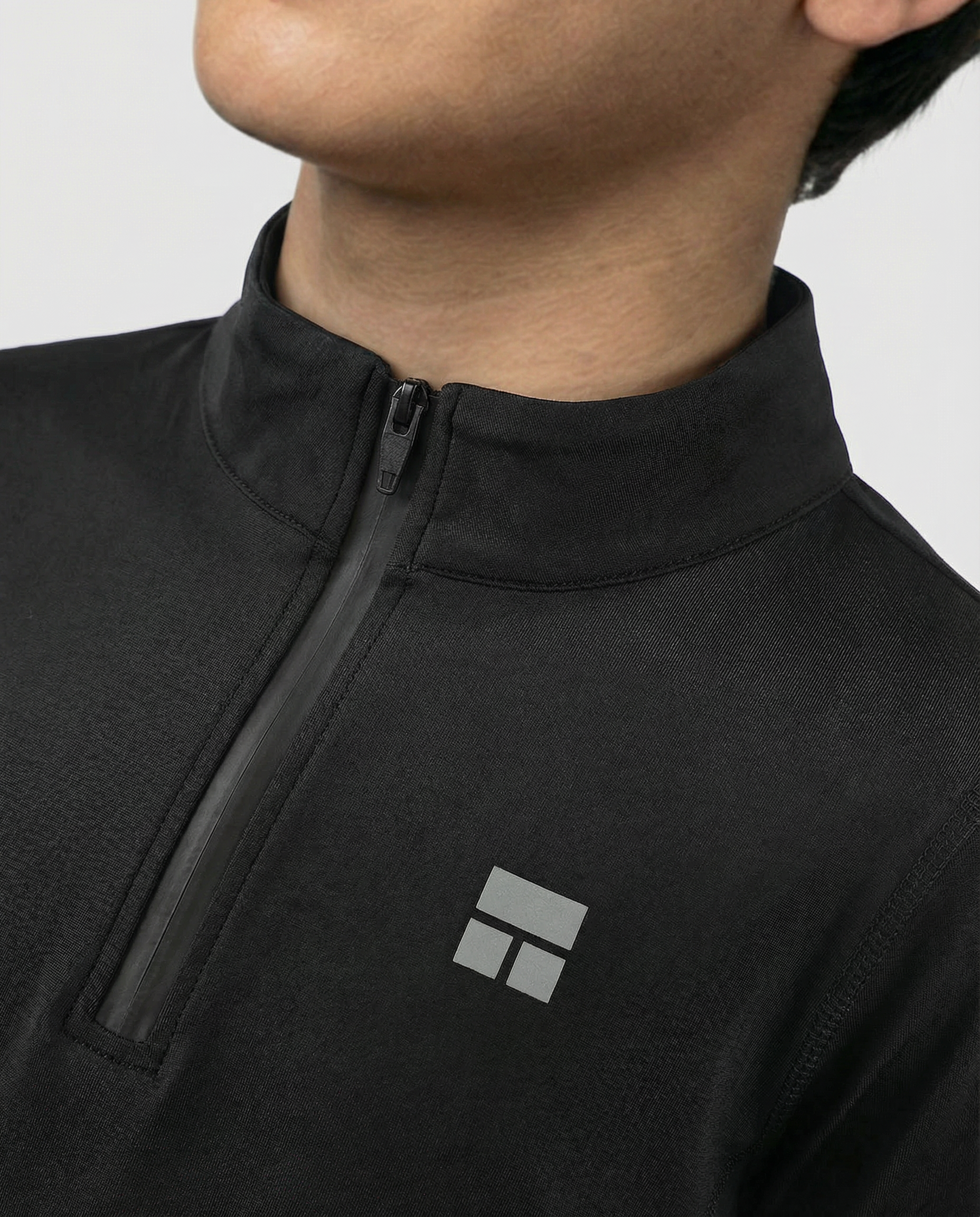 Courts black 1/4 jacket with black accents on a mannequin against a white background.