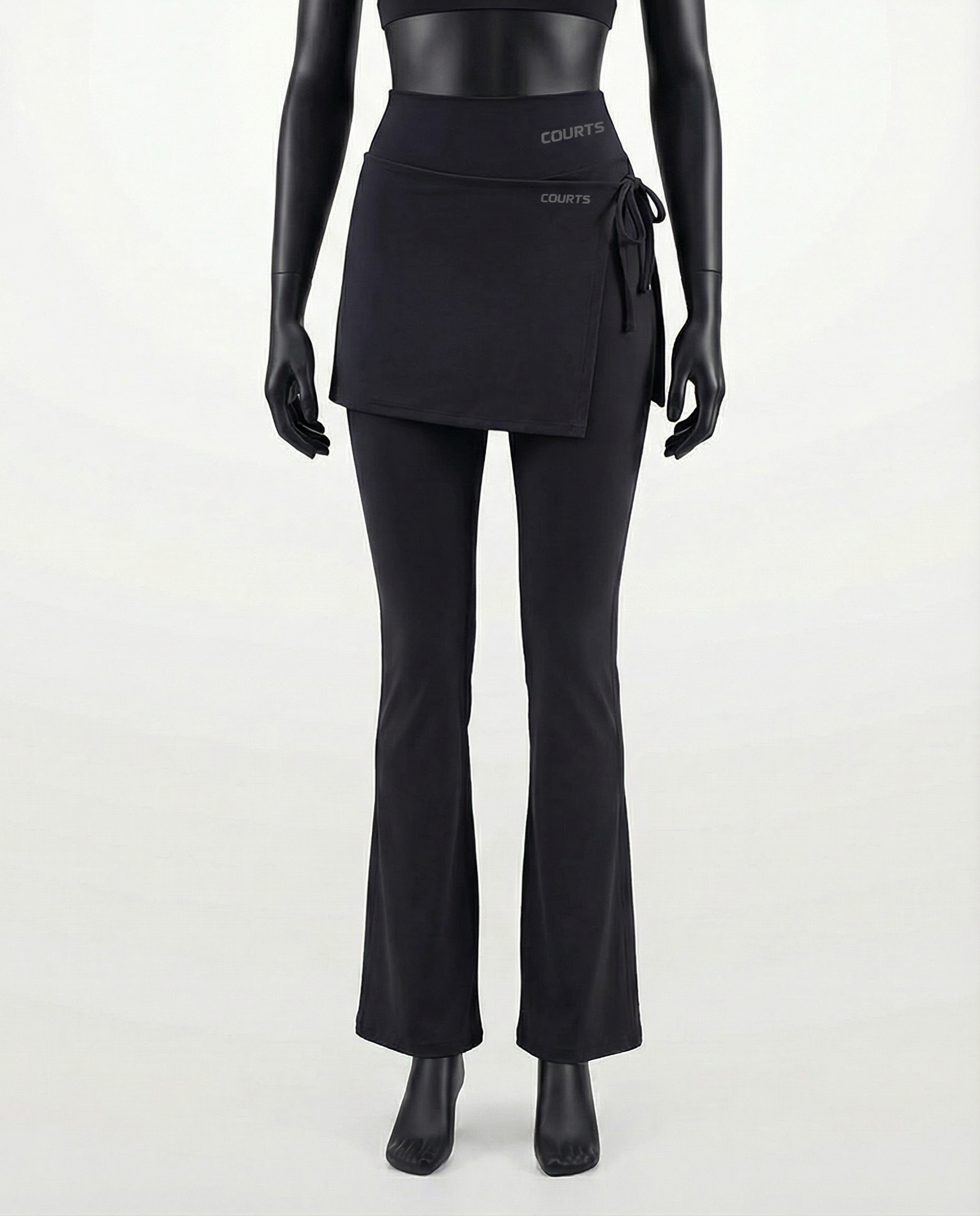 Mannequin wearing a black skirt and pants with 'Courts' branding on a white background