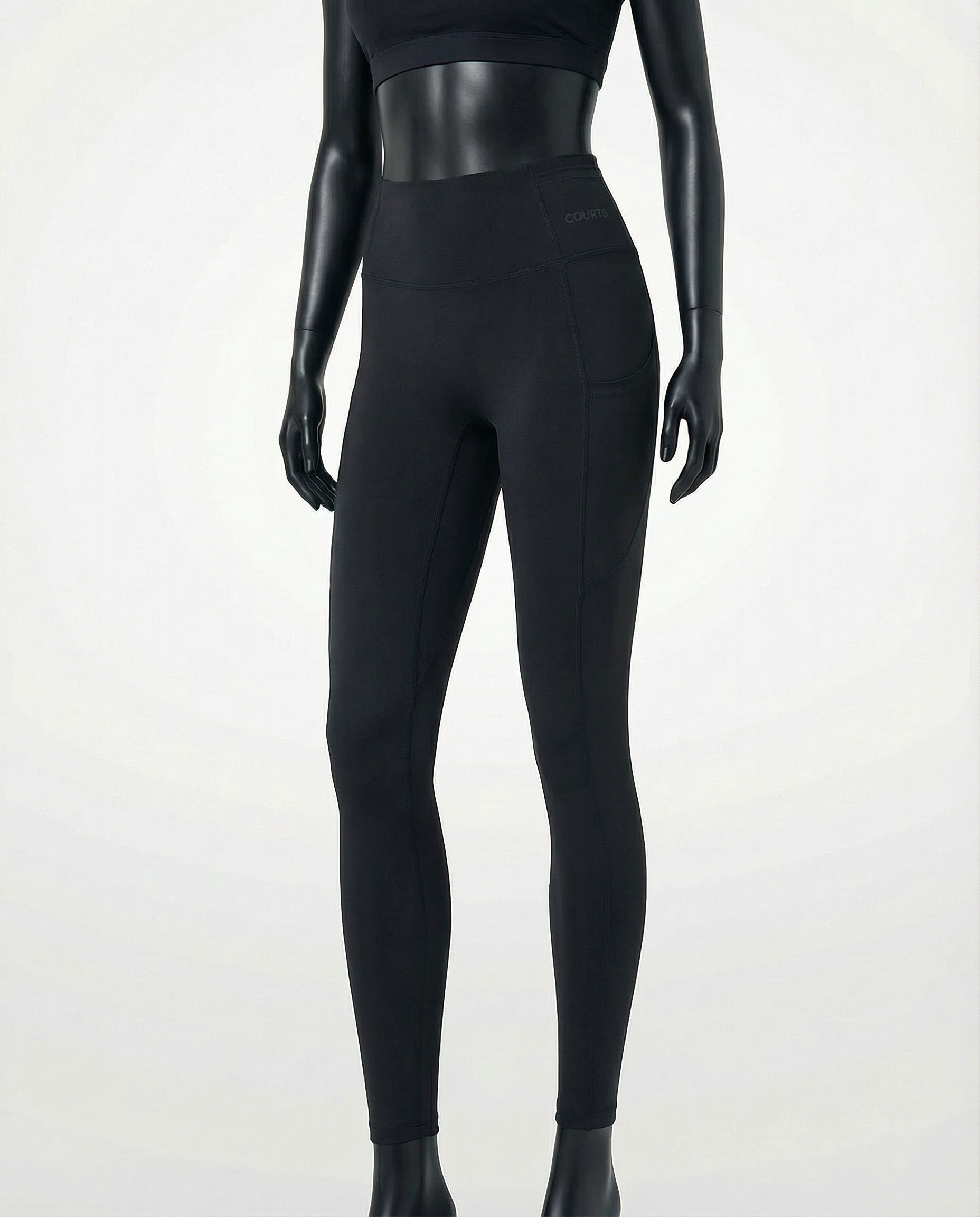 Courts black leggings worn by a mannequin on a white background