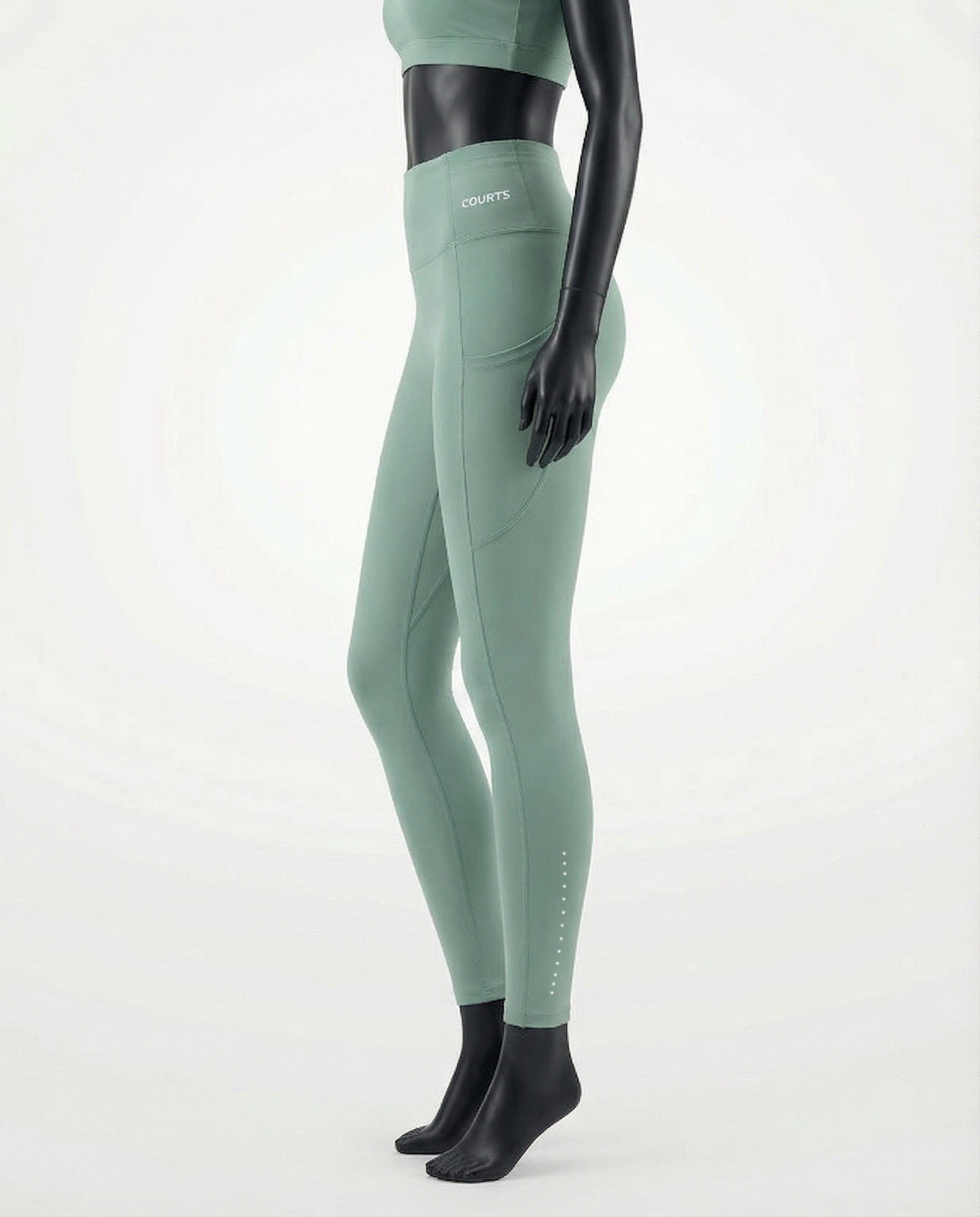 Courts light mint green leggings worn by a mannequin on a white background
