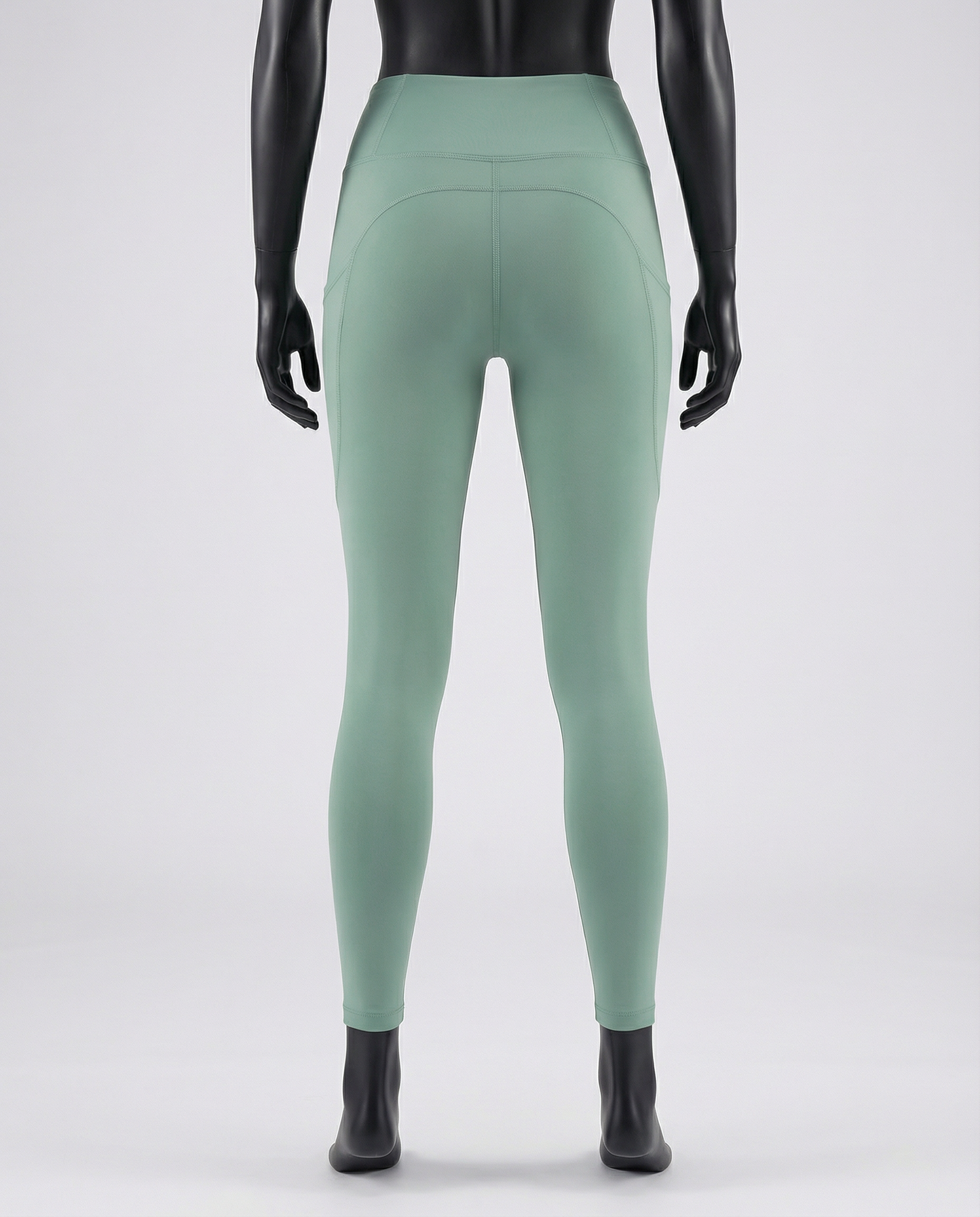 Courts light mint green leggings worn by a mannequin on a white background