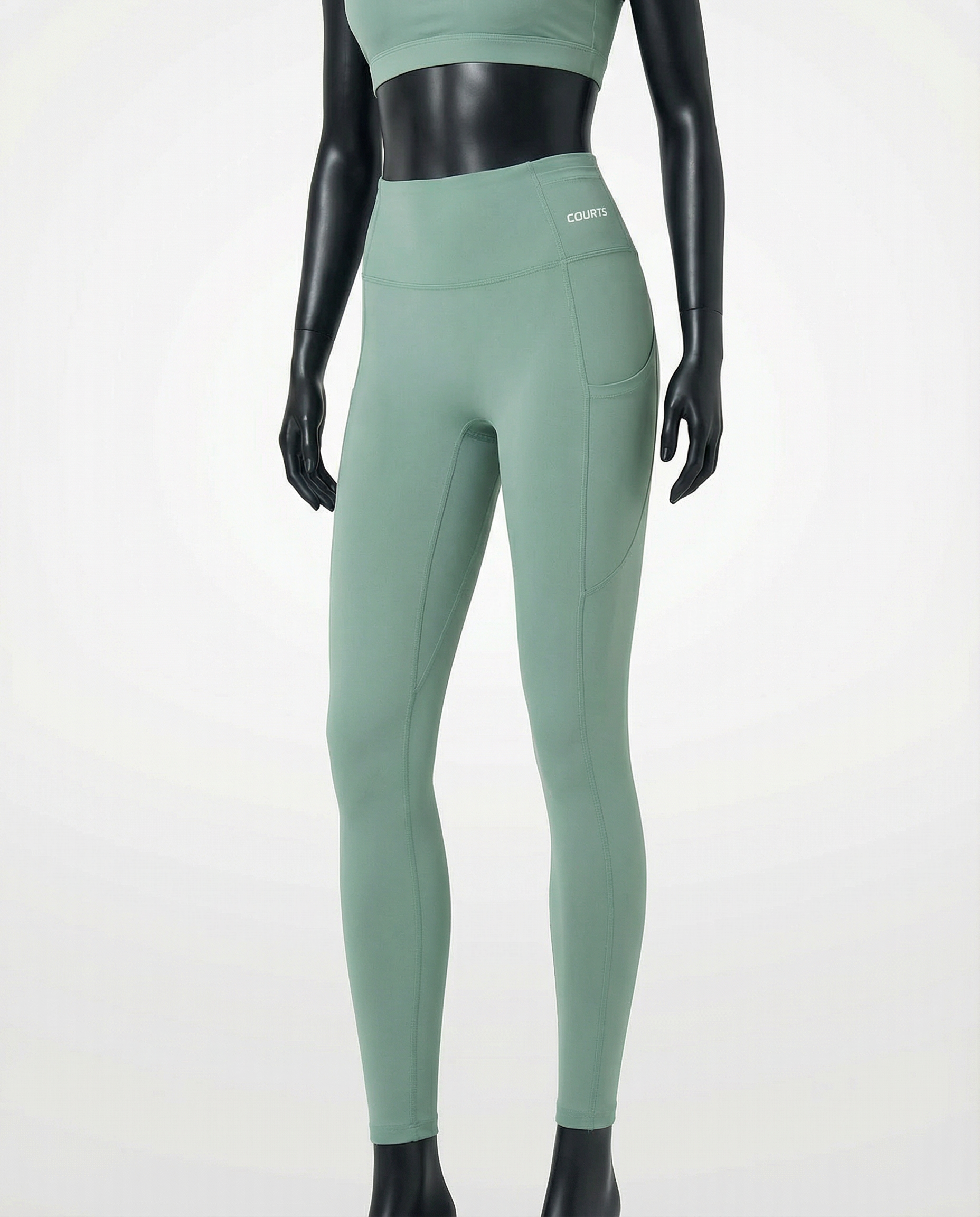 Courts light mint green leggings worn by a mannequin on a white background