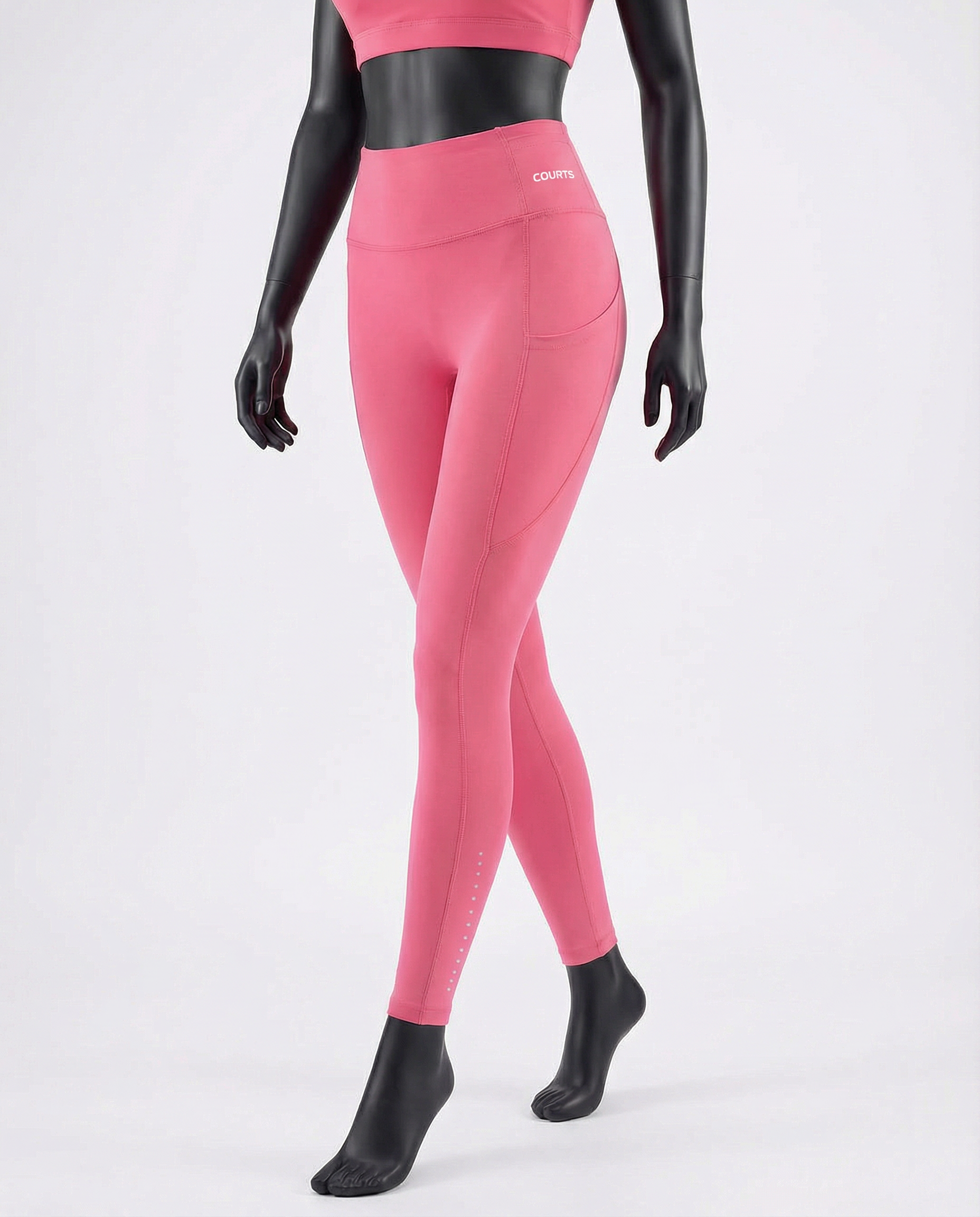 Pink leggings worn by a mannequin on a white background