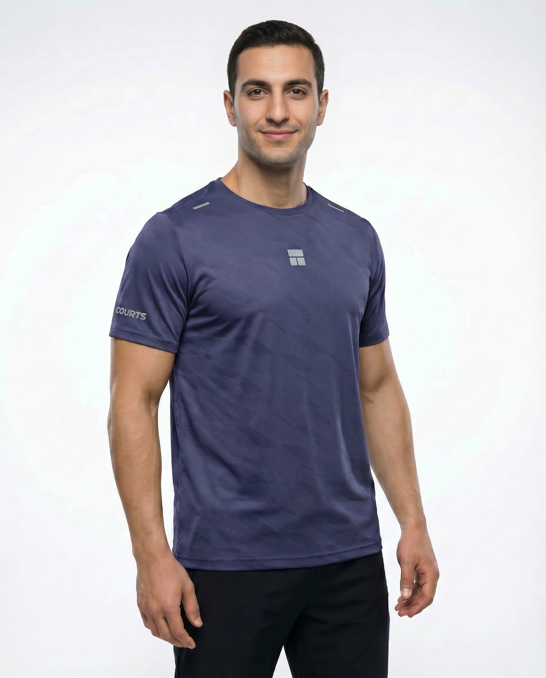 Man wearing a blue courts athletic shirt with a logo on a white background