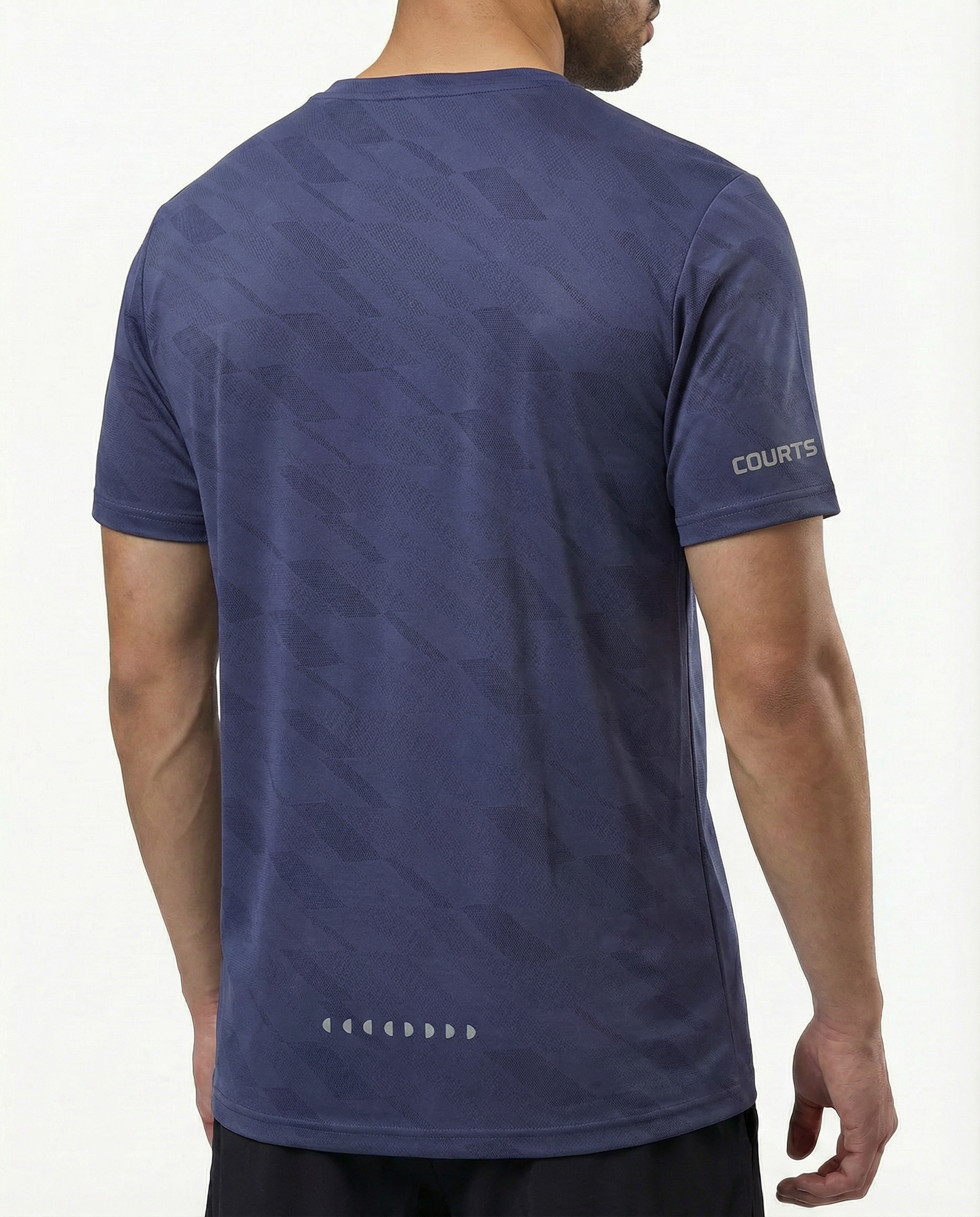 Man wearing a blue courts athletic shirt with a logo on a white background