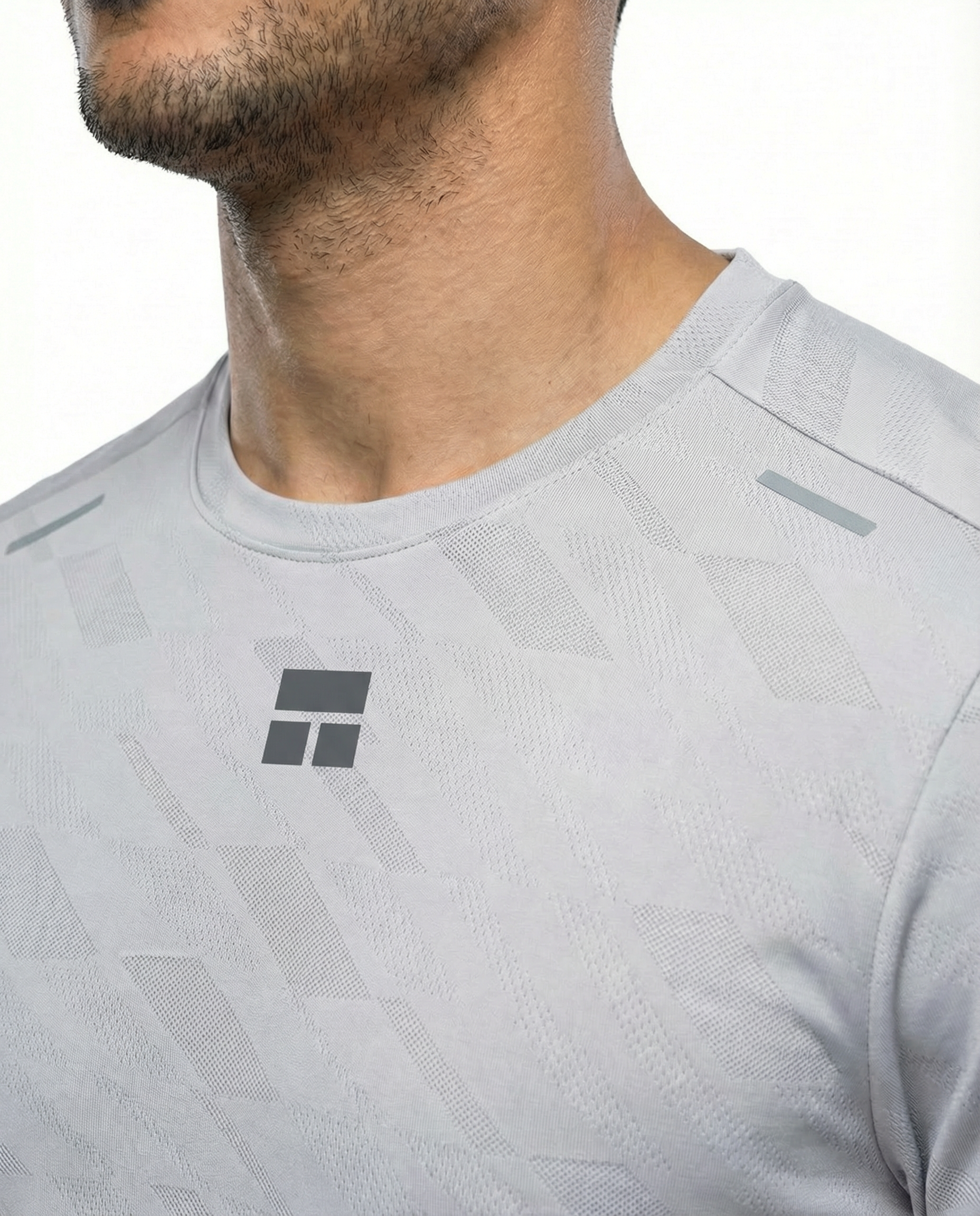 Man wearing a courts sport gray t-shirt with a logo on a white background