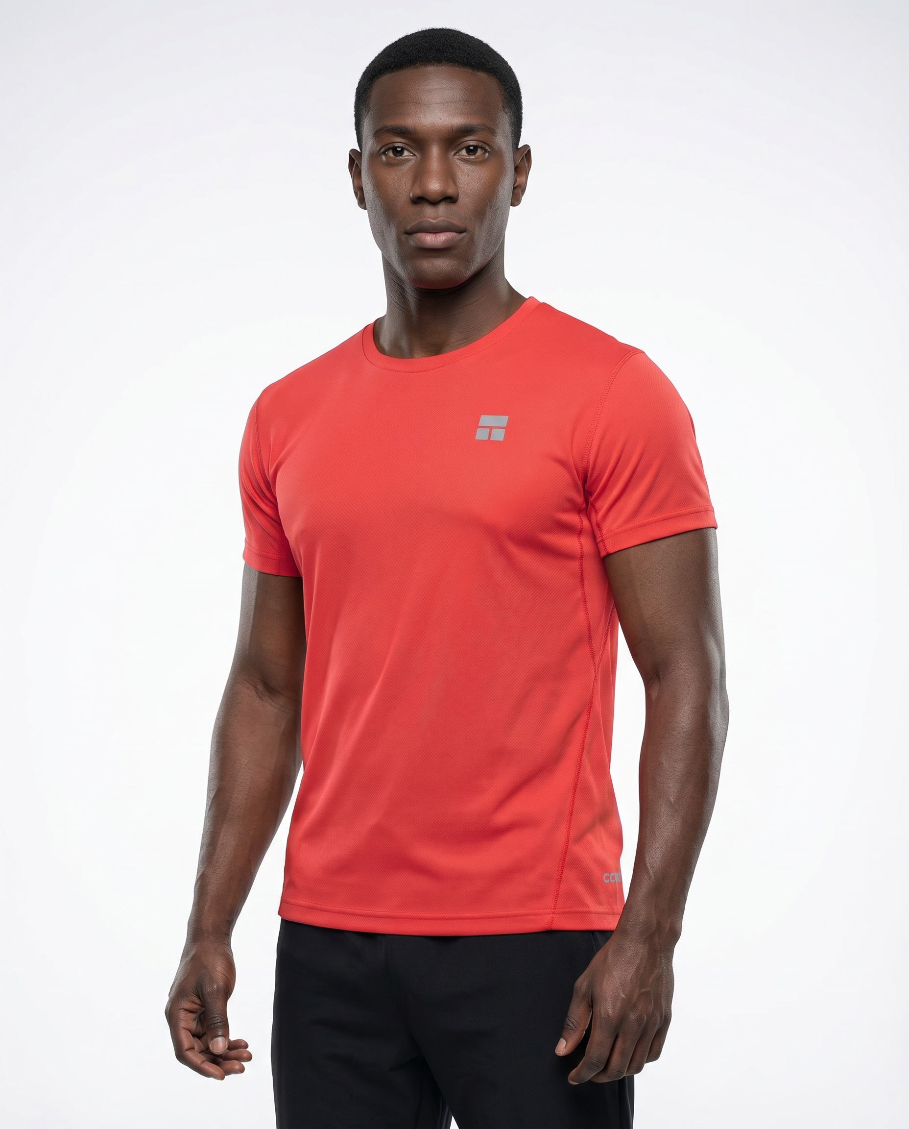 Man wearing a red t-shirt with a small logo on a white background
Courts Sport