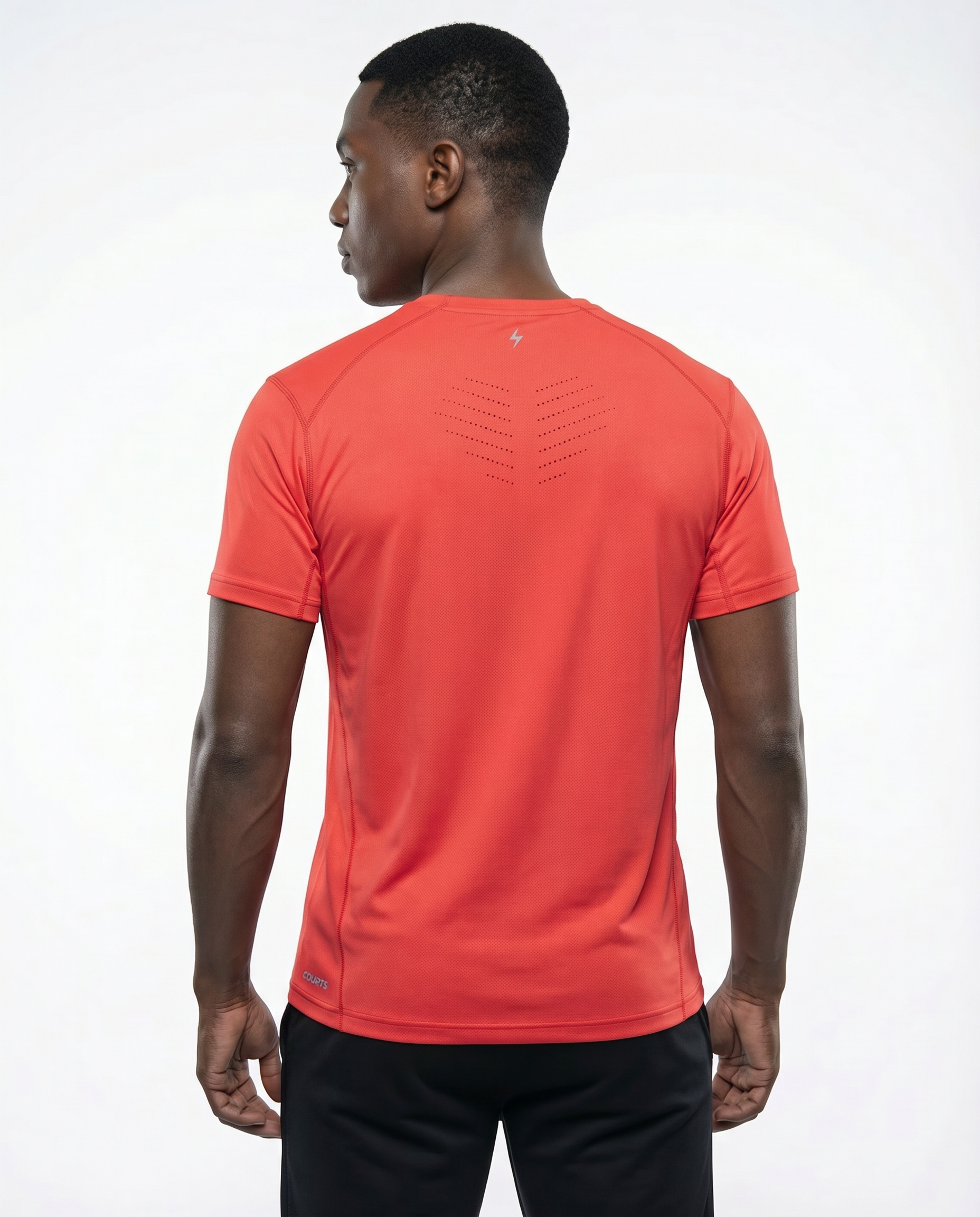 Man wearing a red t-shirt with a small logo on a white background
Courts Sport
