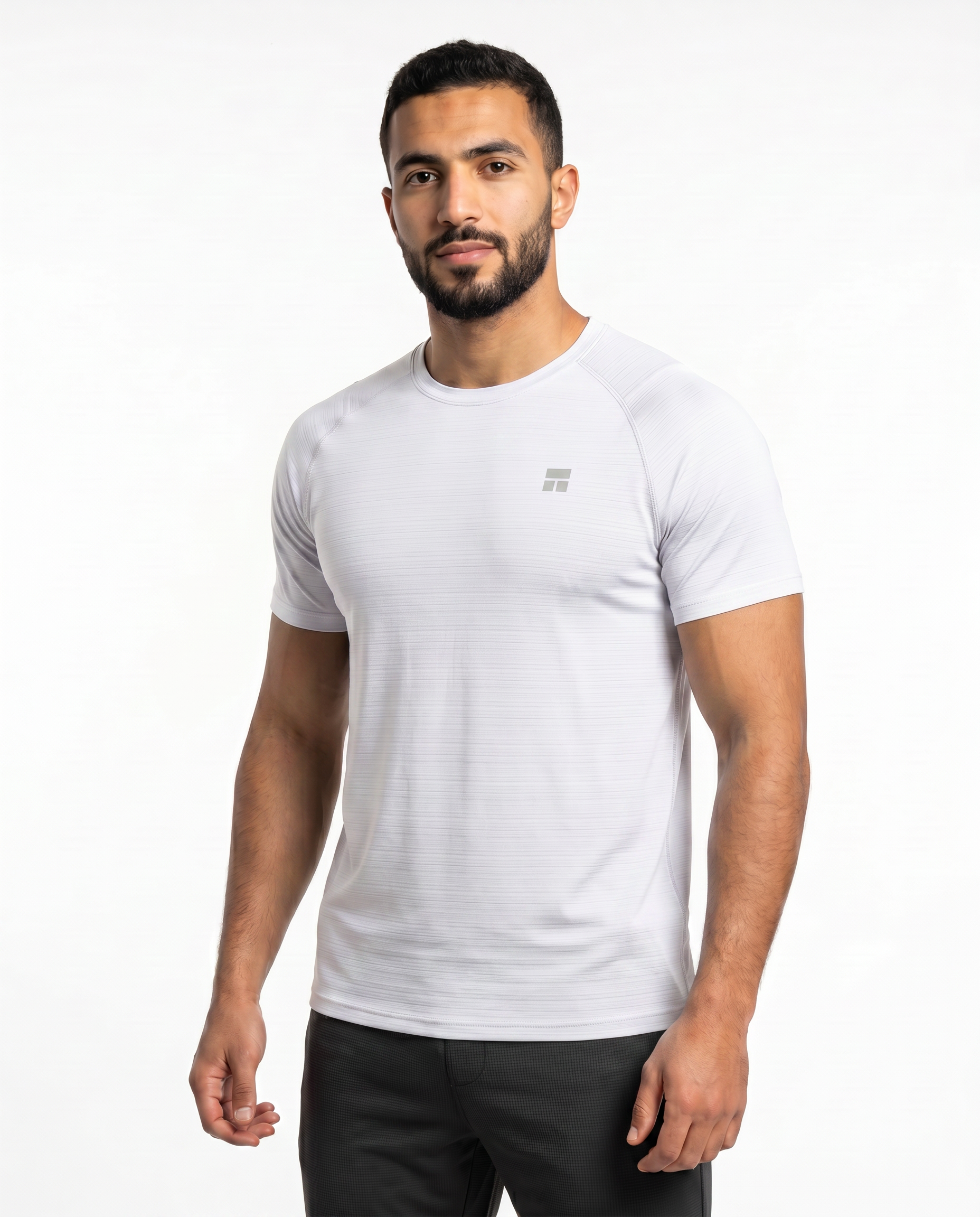 Man wearing a white t-shirt with a small logo on a white background
#color_white
