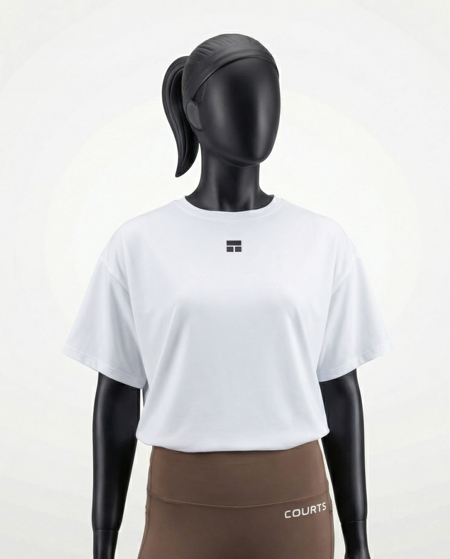 Oversized women’s T-shirt with a clean minimalist design, relaxed drop-shoulder fit, and smooth lightweight fabric, ideal for breathable comfort and versatile everyday wear.