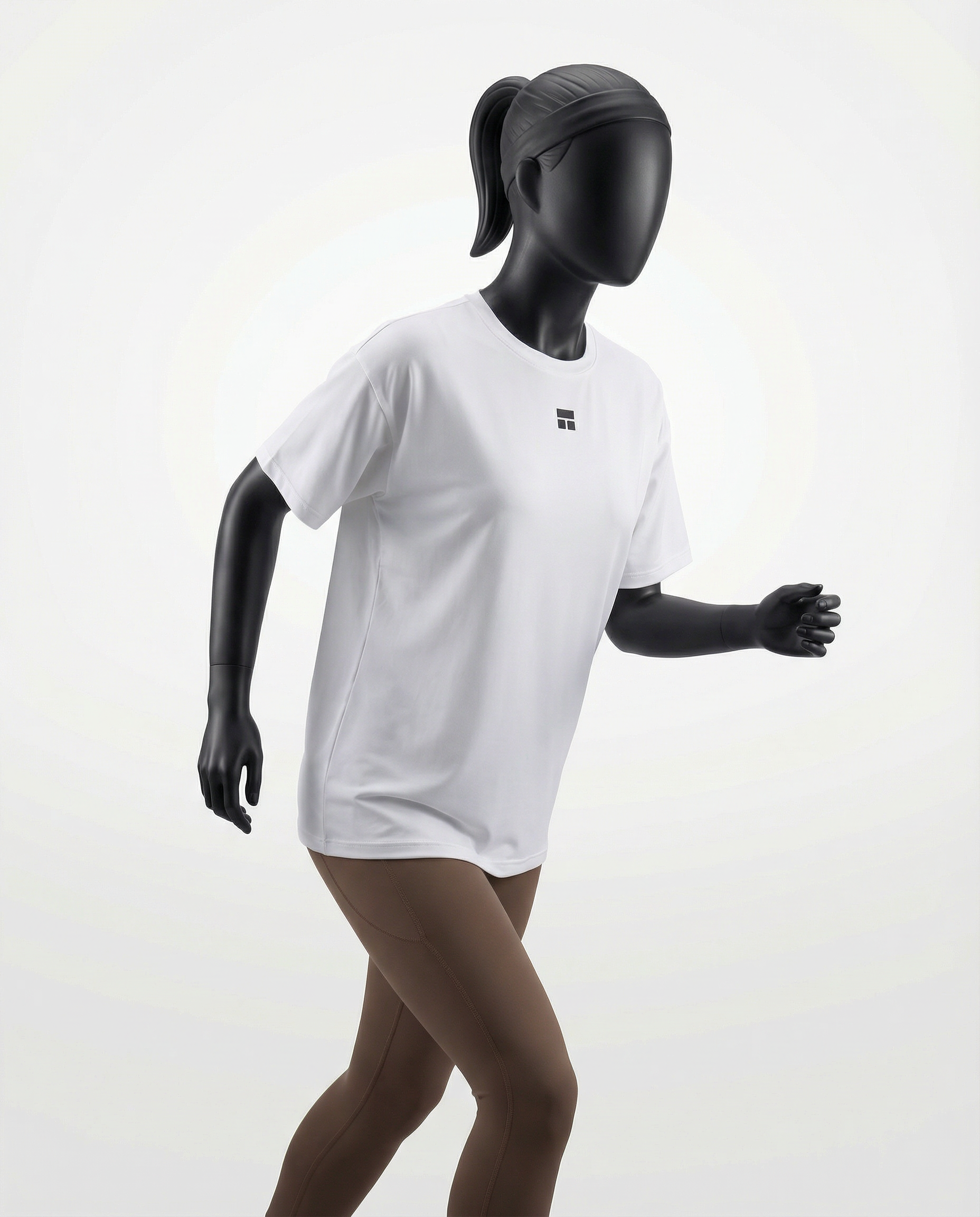 Oversized women’s T-shirt with a clean minimalist design, relaxed drop-shoulder fit, and smooth lightweight fabric, ideal for breathable comfort and versatile everyday wear.