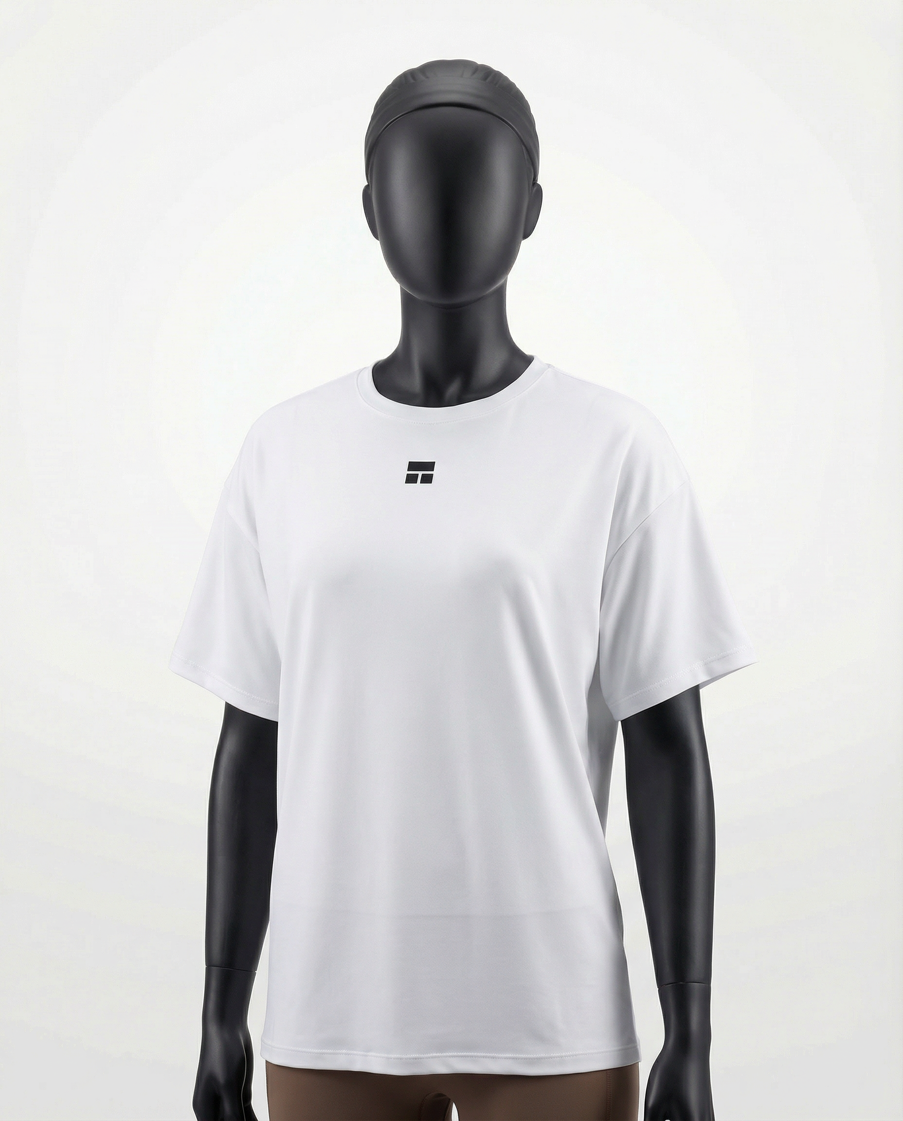 Oversized women’s T-shirt with a clean minimalist design, relaxed drop-shoulder fit, and smooth lightweight fabric, ideal for breathable comfort and versatile everyday wear.