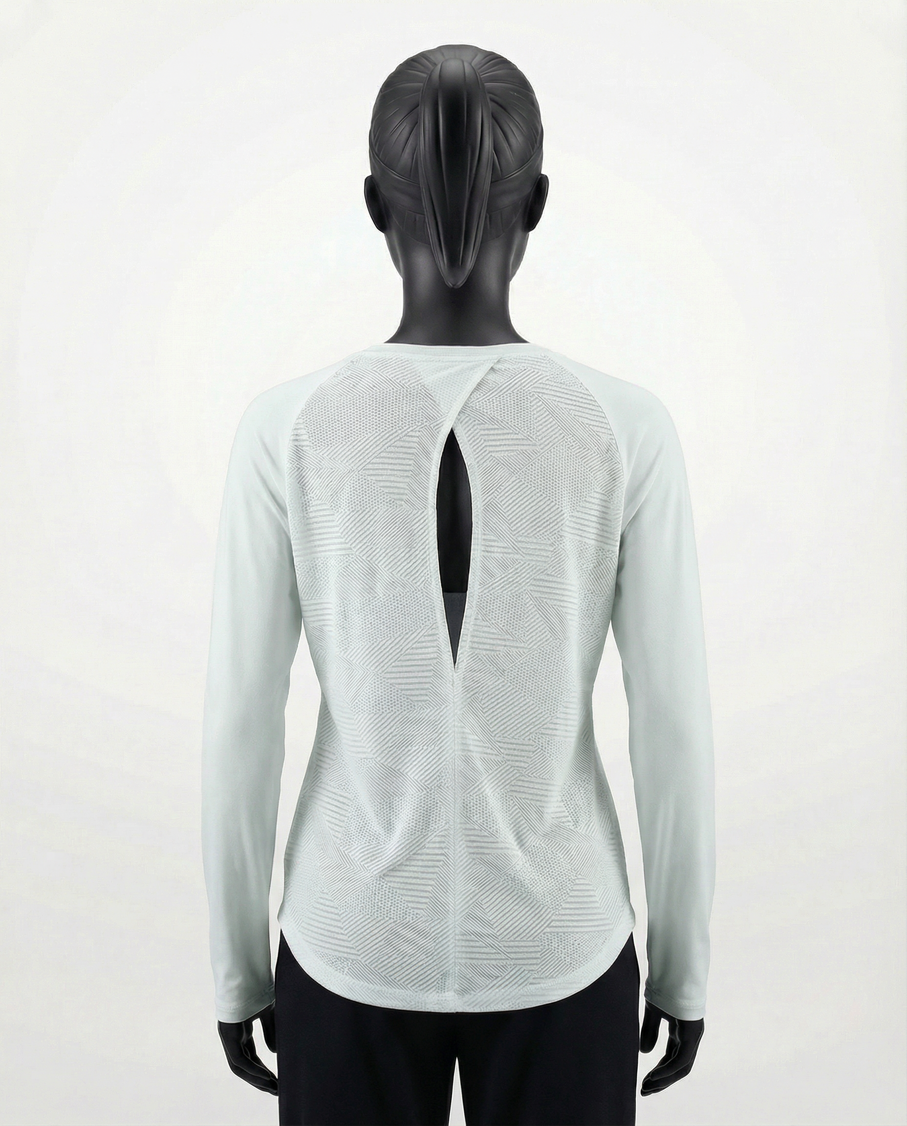 Mannequin wearing a light gray long-sleeve top with a cutout design on a white background