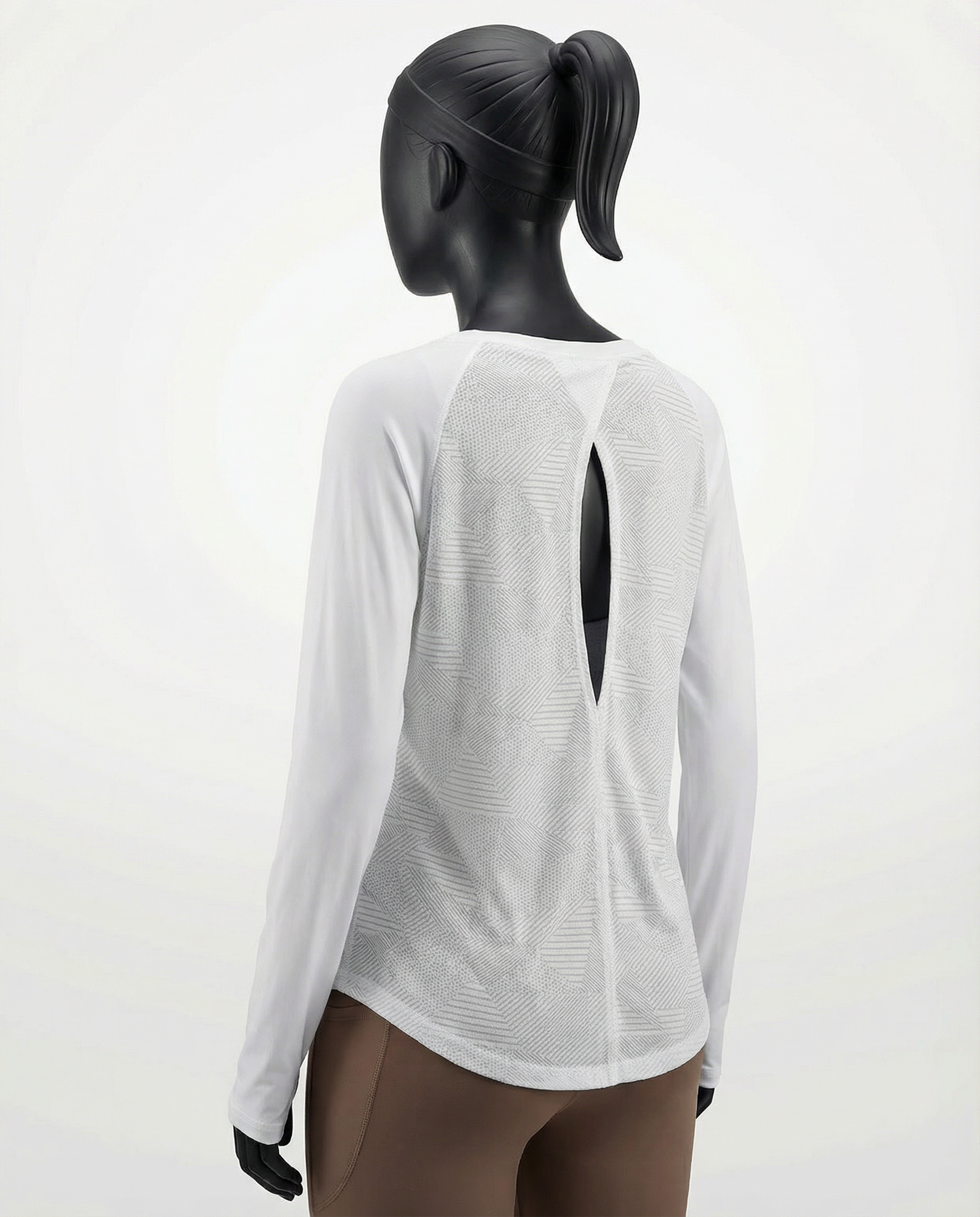 Mannequin wearing a white long-sleeve top with a cutout design on a white background