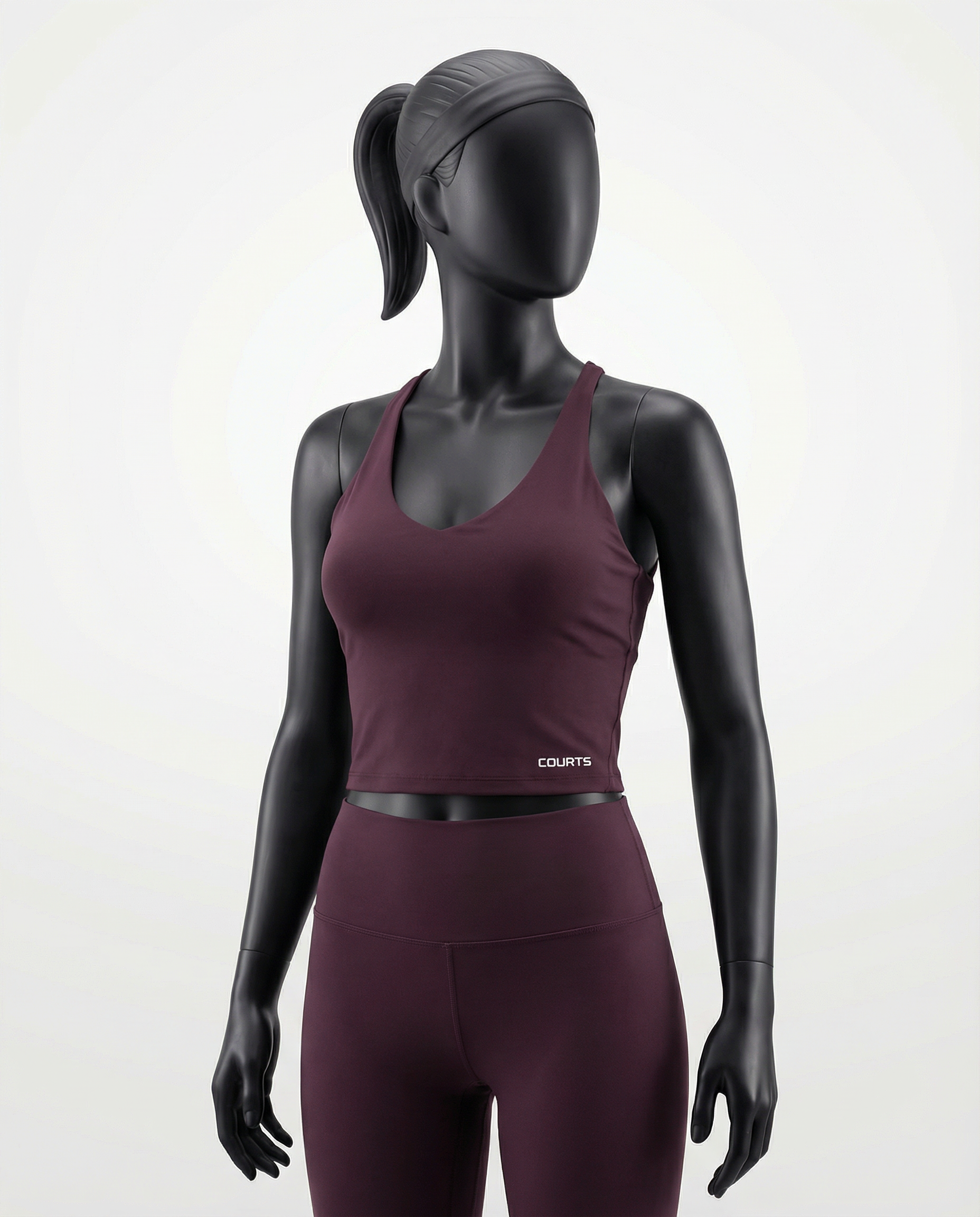 Courts grape purple - maroon athletic crop top and leggings on a mannequin against a white background
#color_grape-purple