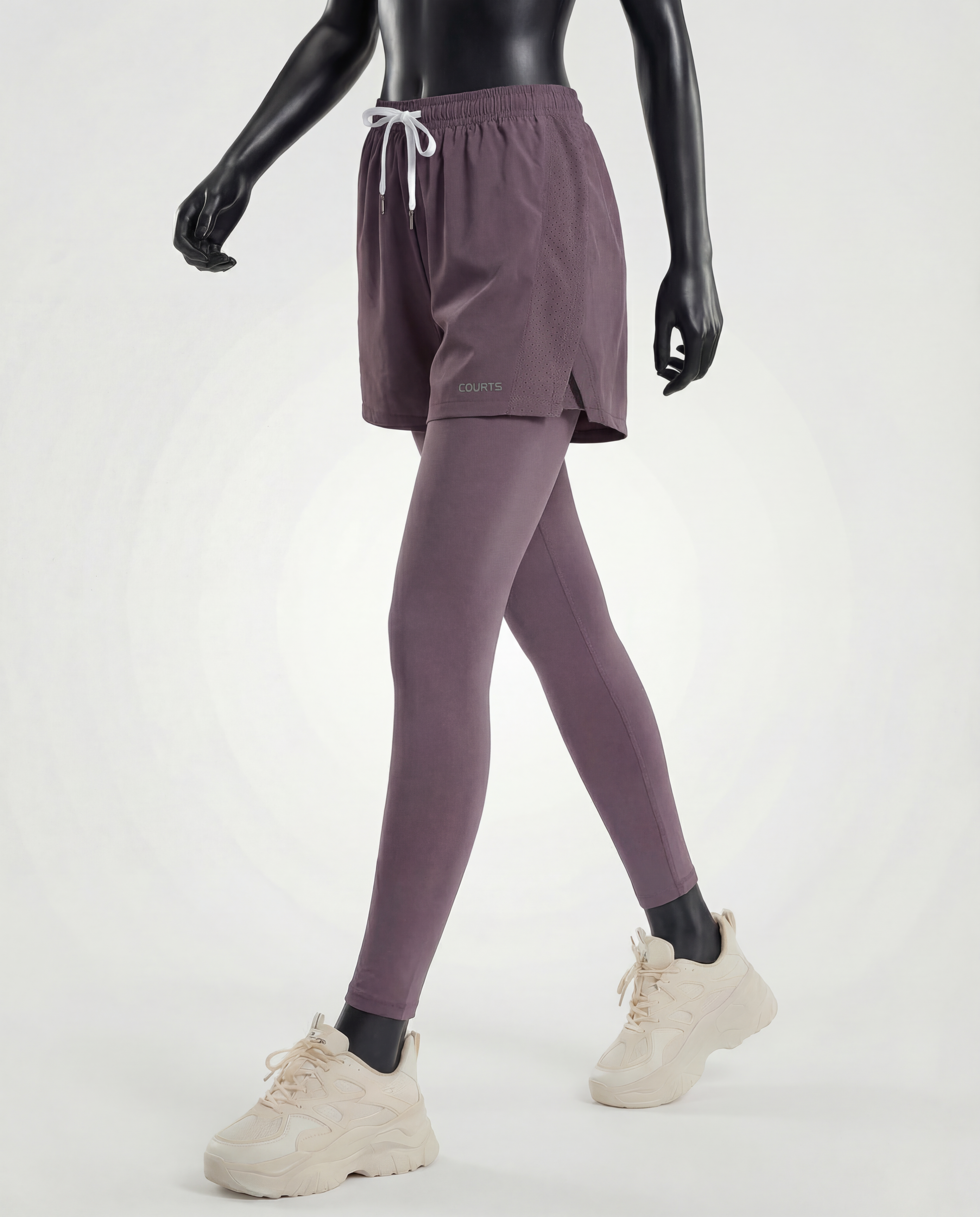 Mannequin wearing purple athletic pants and shoes on a white background
#color_purple