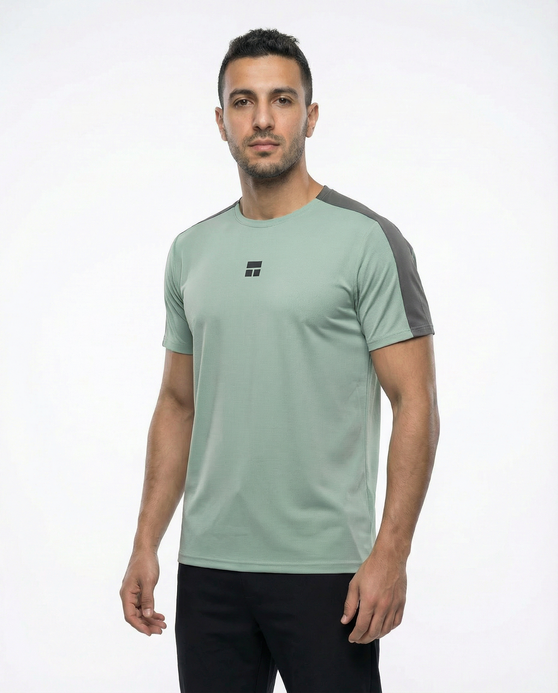 Man wearing a green athletic shirt with a logo on a white background
Courts Sport
#color_frost-green