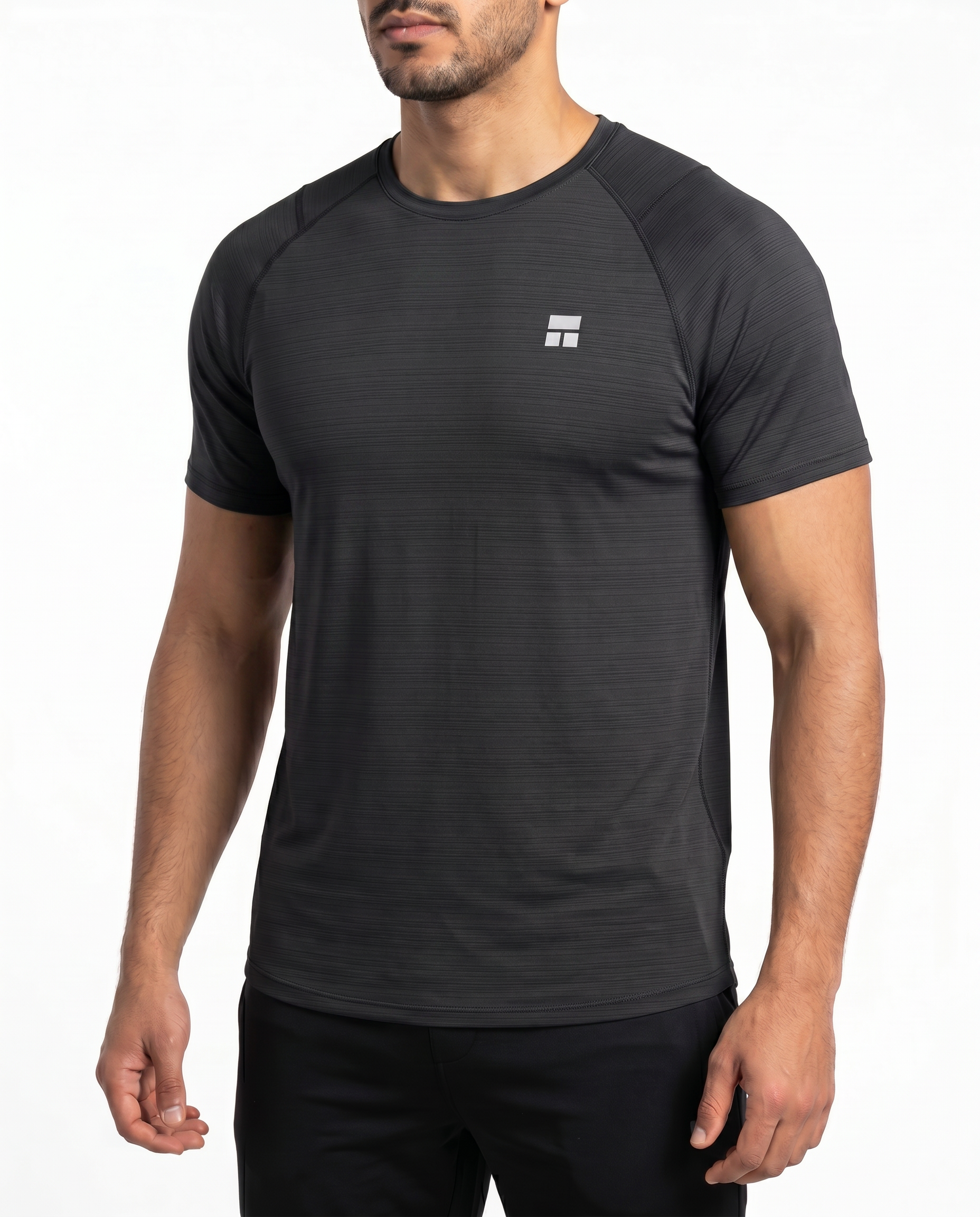 Man wearing a black athletic outfit with a logo on a white background
