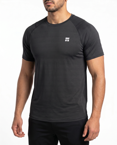 Man wearing a black athletic outfit with a logo on a white background
