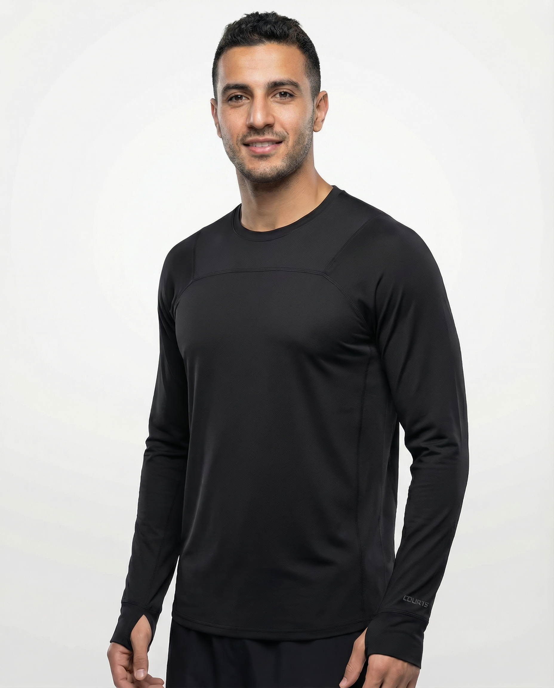 Man wearing a black long-sleeve athletic shirt on a white background
Courts Sport
#color_black