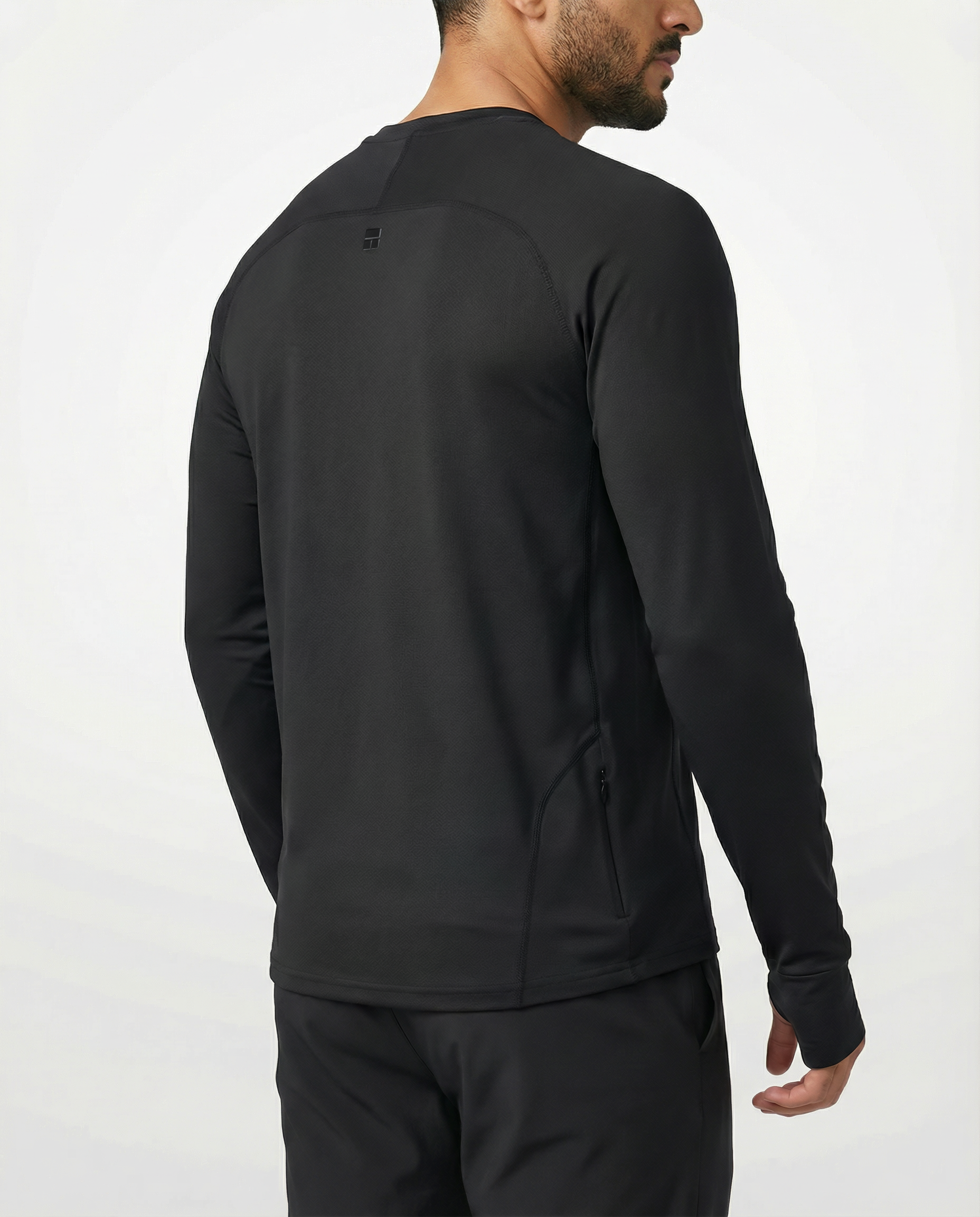 Man wearing a black long-sleeve athletic shirt on a white background
Courts Sport
#color_black