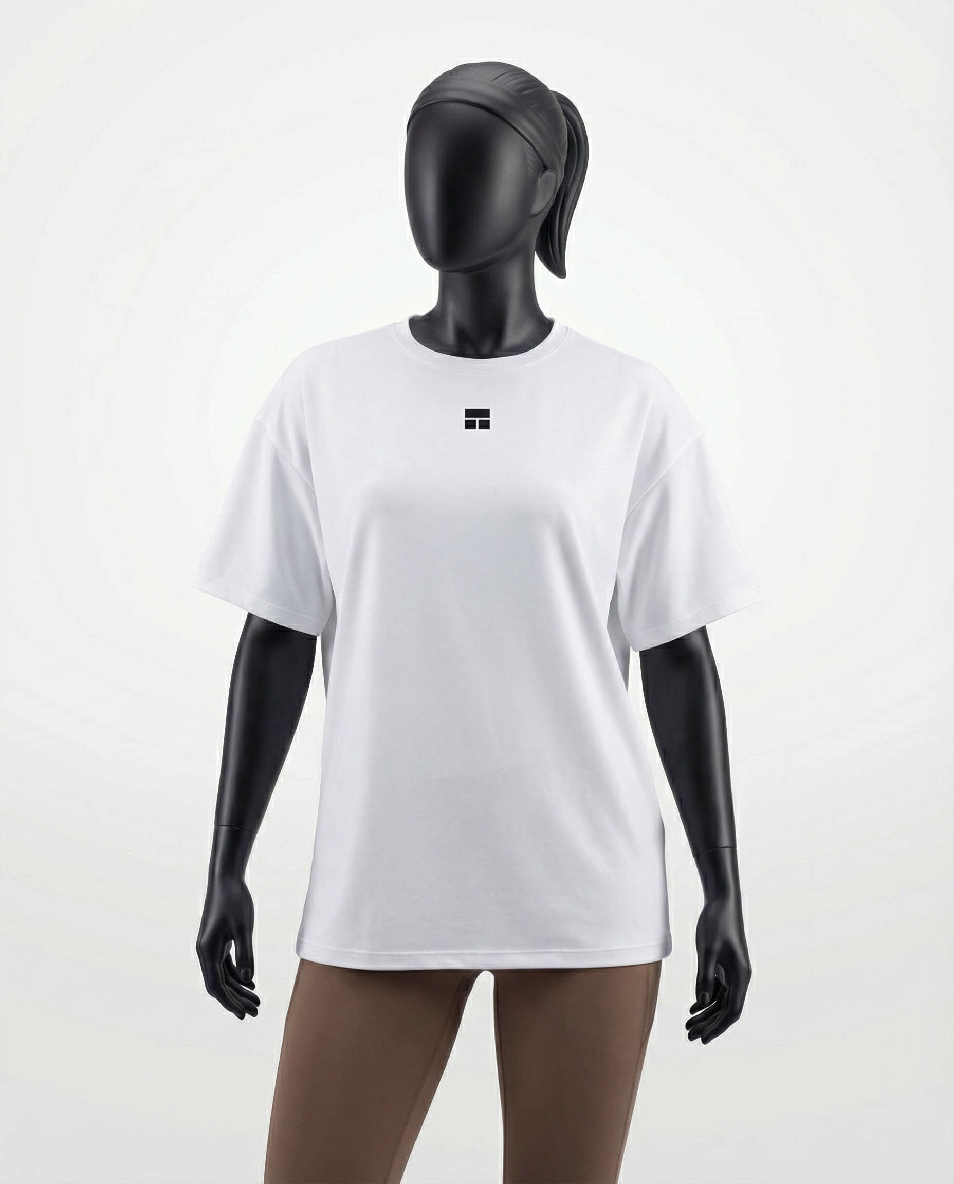 Oversized women’s T-shirt with a clean minimalist design, relaxed drop-shoulder fit, and smooth lightweight fabric, ideal for breathable comfort and versatile everyday wear.

#color_white