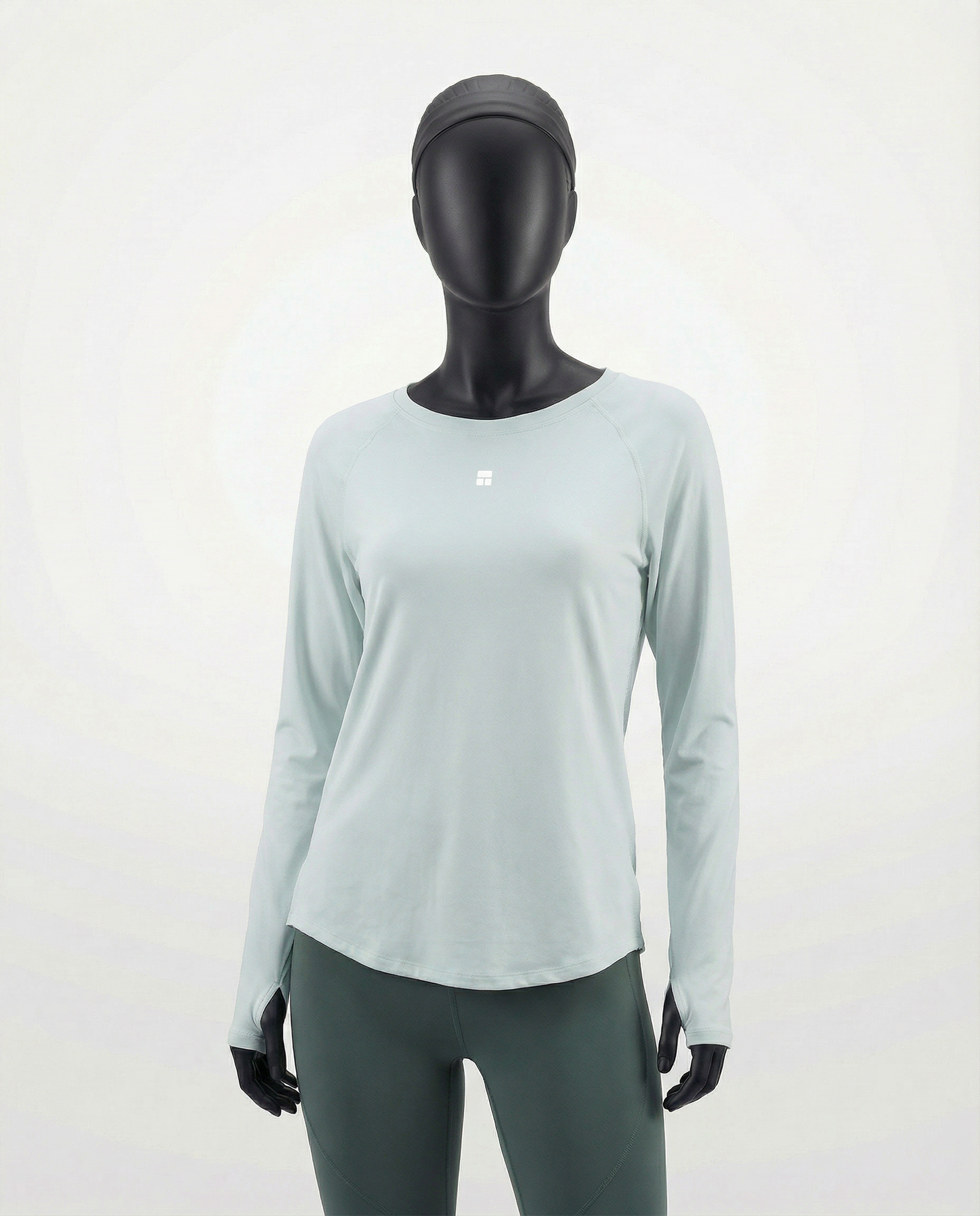 Mannequin wearing a light gray long-sleeve top with a cutout design on a white background
#color_mint-green